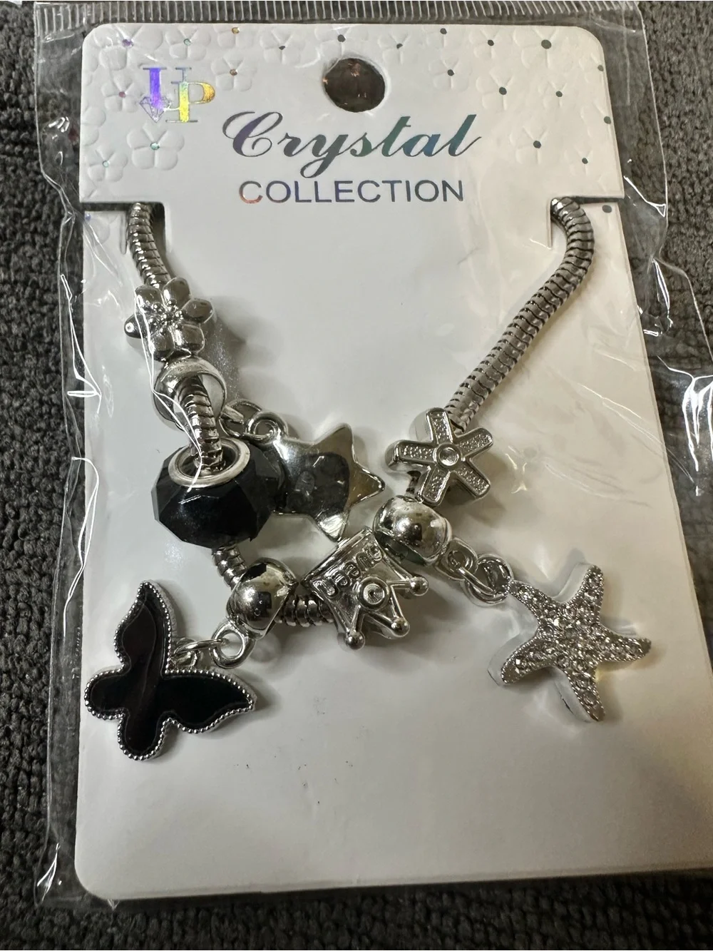 Butterfly Dsigns Silver and Black Charm Bracelet with Starfish & Butterfly